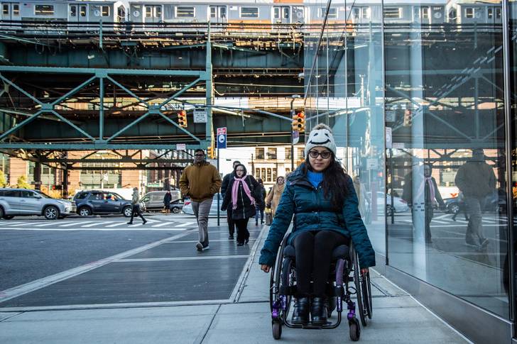 Katherine Valdez uses a wheelchair to commute from her home in Briarwood, Queens, to work in Long Island City.